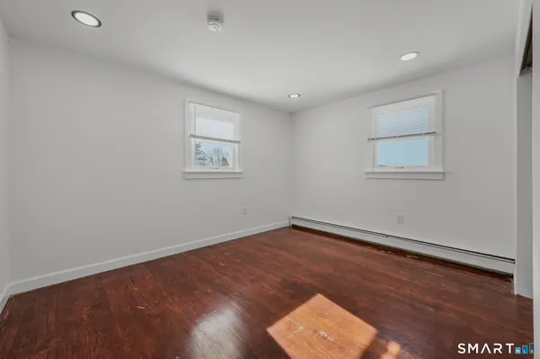 a view of a chairs and table in a room