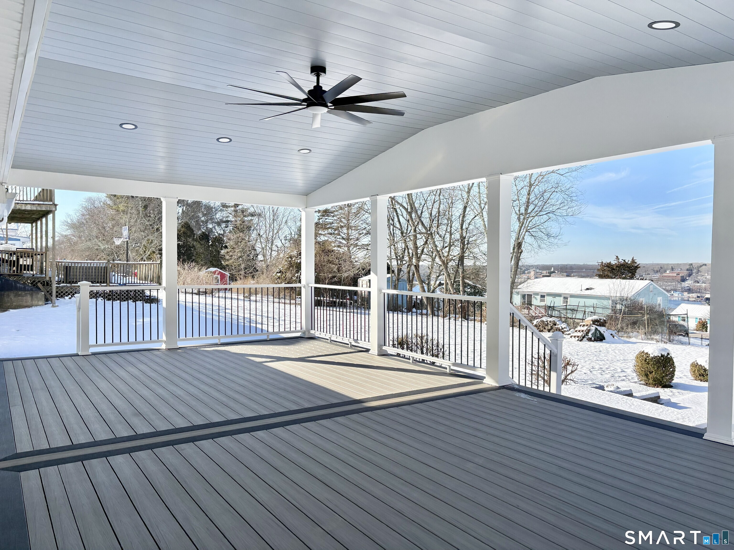 31 Pegasus Drive Groton, CT 06340 - Photo 3 of 17 a view of a balcony with wooden floor