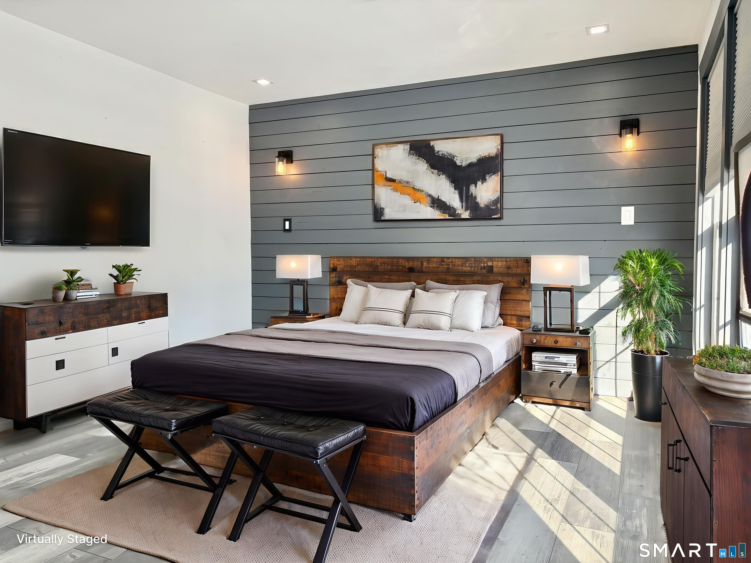 31 Pegasus Drive Groton, CT 06340 - Photo 8 of 17 a bedroom with a bed and a flat screen tv