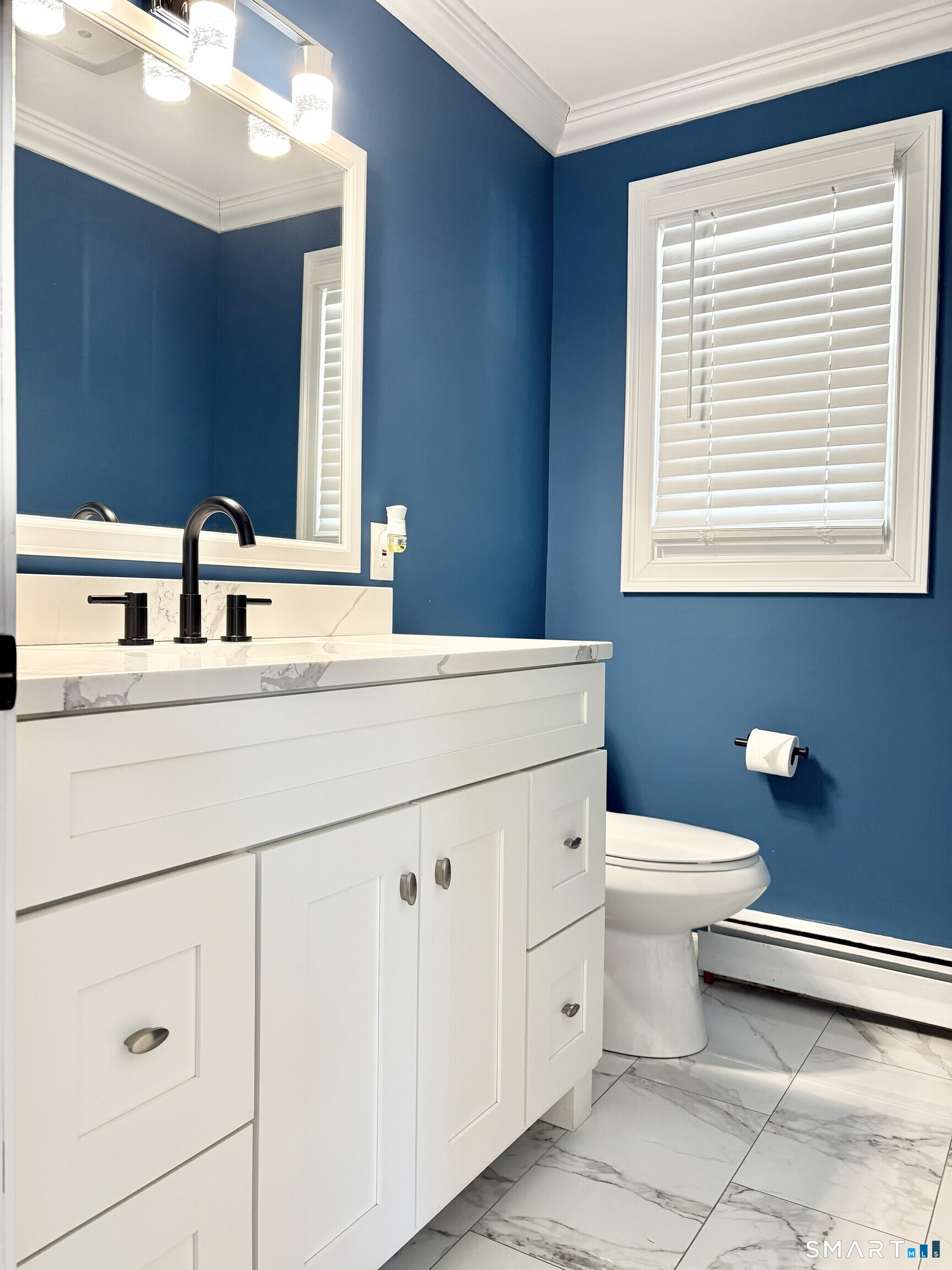 31 Pegasus Drive Groton, CT 06340 - Photo 9 of 17 a bathroom with a toilet sink and mirror