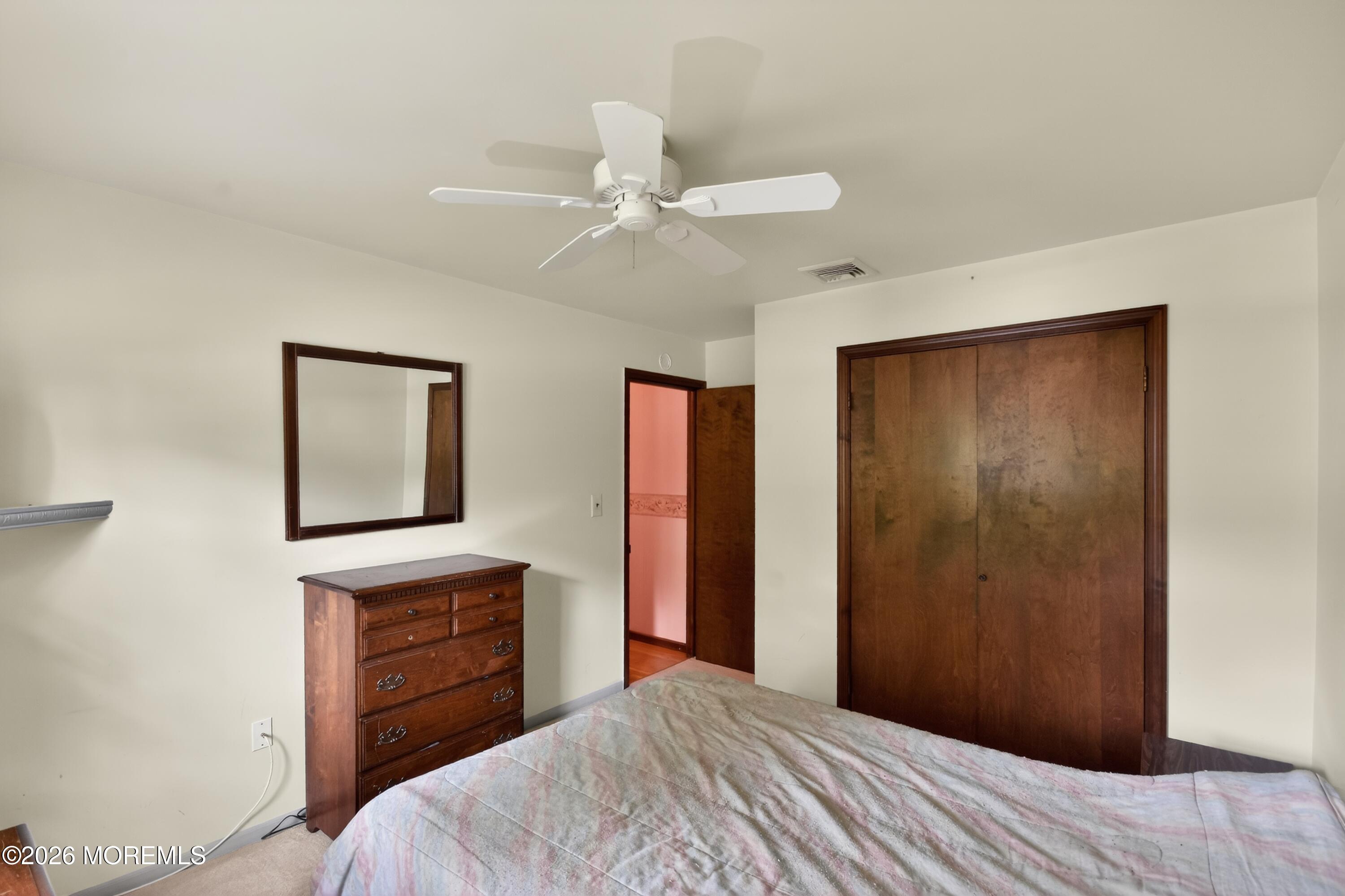 17 Point O Woods Road Middletown, NJ 07748 - Photo 29 of 60 45_17_Point_O_Woods_Rd-Bedroom-0098