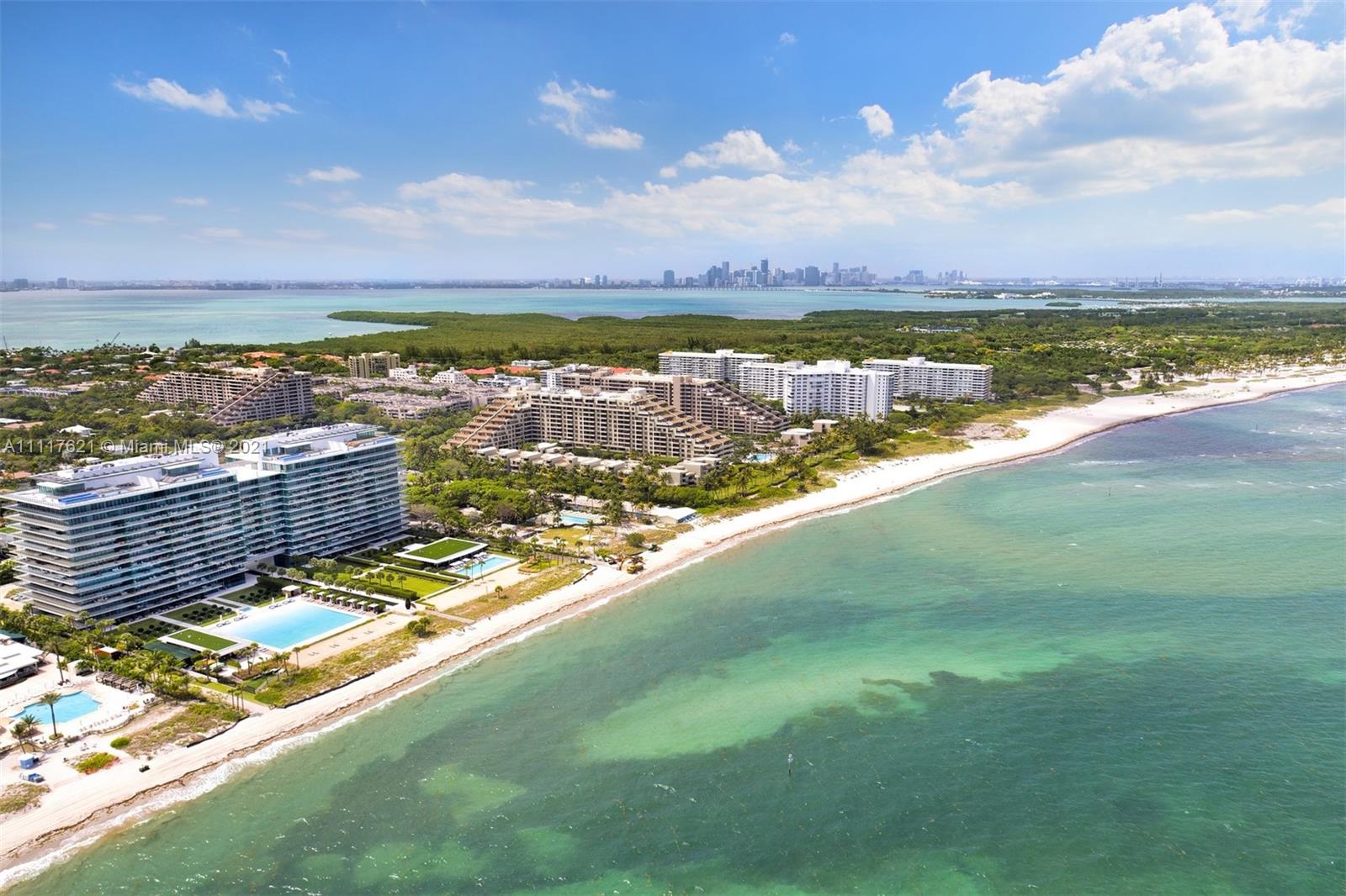 360 Ocean Drive, Unit 1106S Key Biscayne, FL 33149 - Photo 2 of 35 a view of a lake with a city
