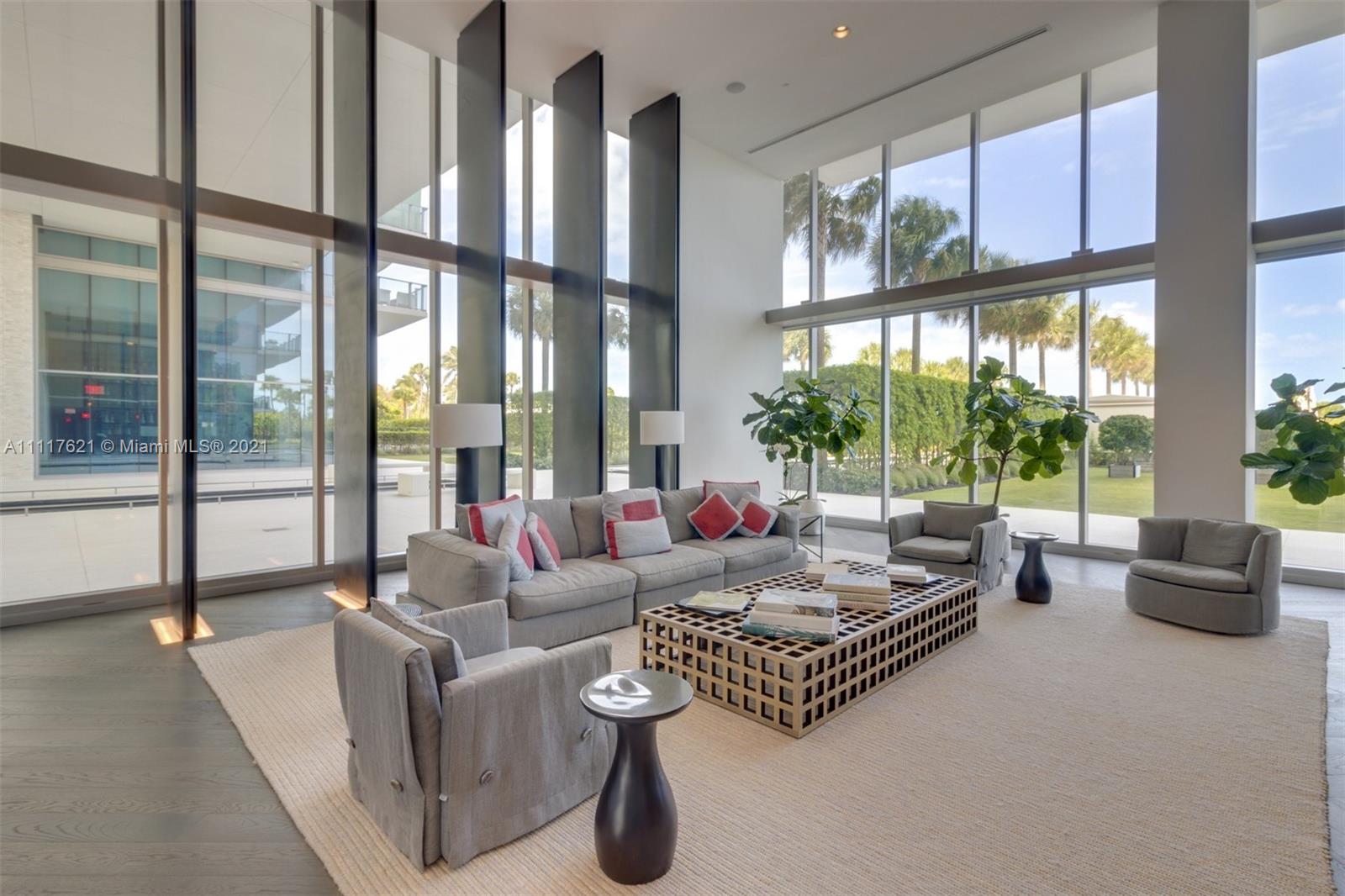 360 Ocean Drive, Unit 1106S Key Biscayne, FL 33149 - Photo 27 of 35 a living room with furniture and a large window