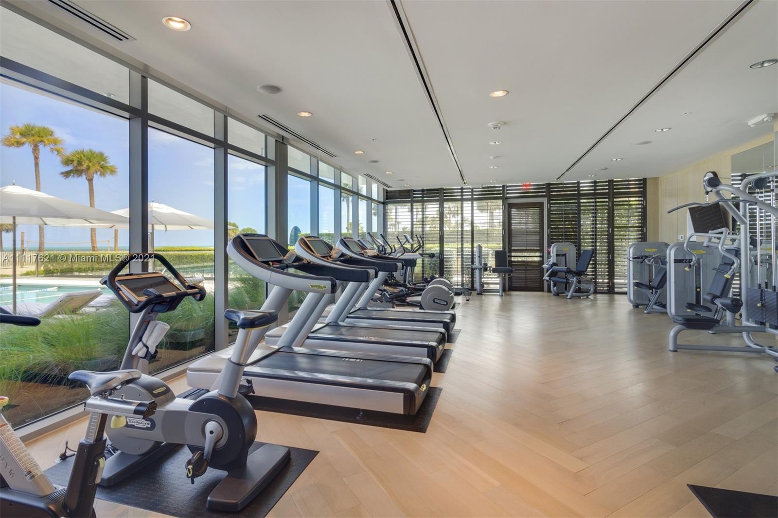 360 Ocean Drive, Unit 1106S Key Biscayne, FL 33149 - Photo 29 of 35 a view of a room with gym equipment
