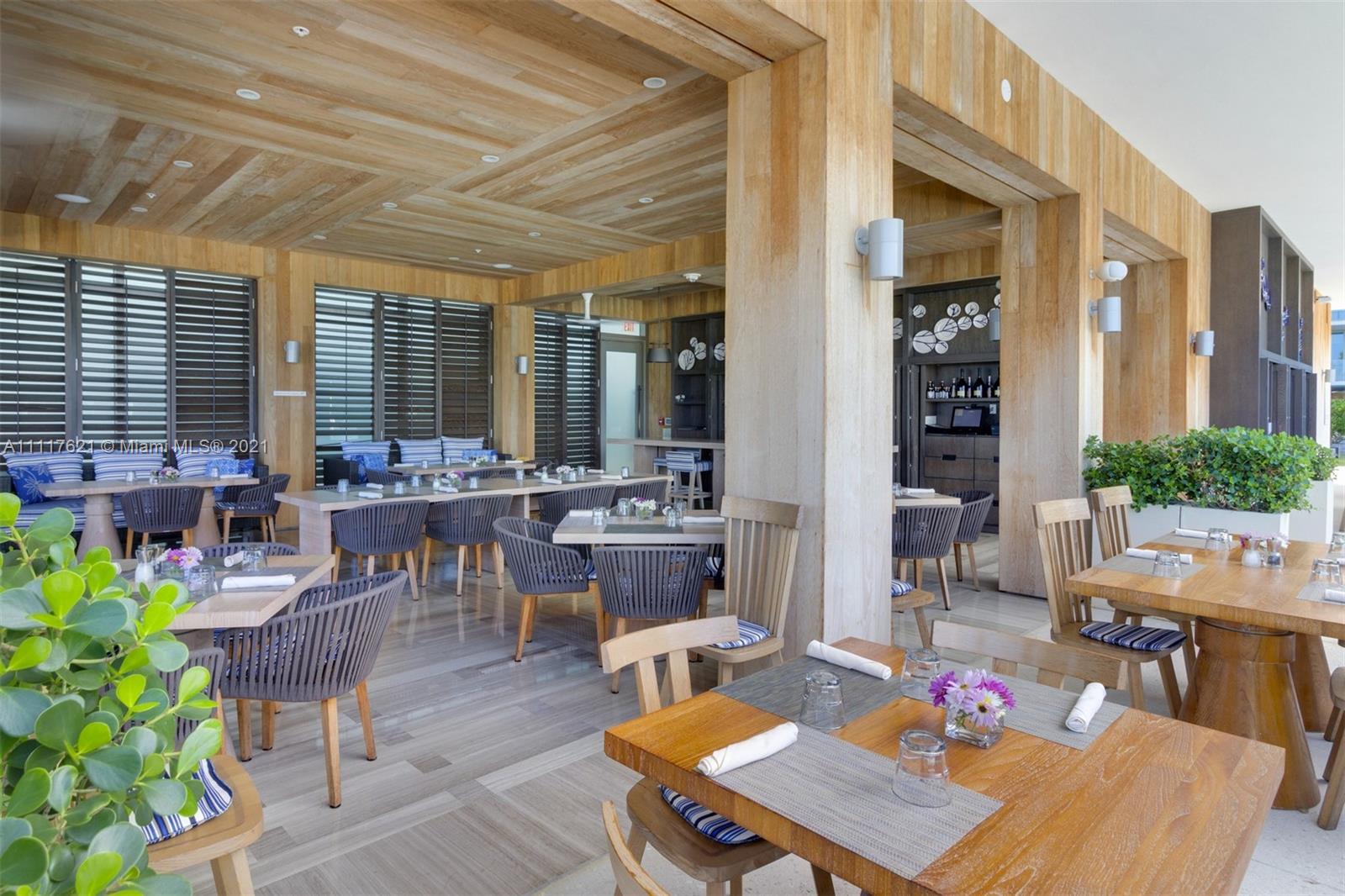 360 Ocean Drive, Unit 1106S Key Biscayne, FL 33149 - Photo 31 of 35 a outdoor space with furniture