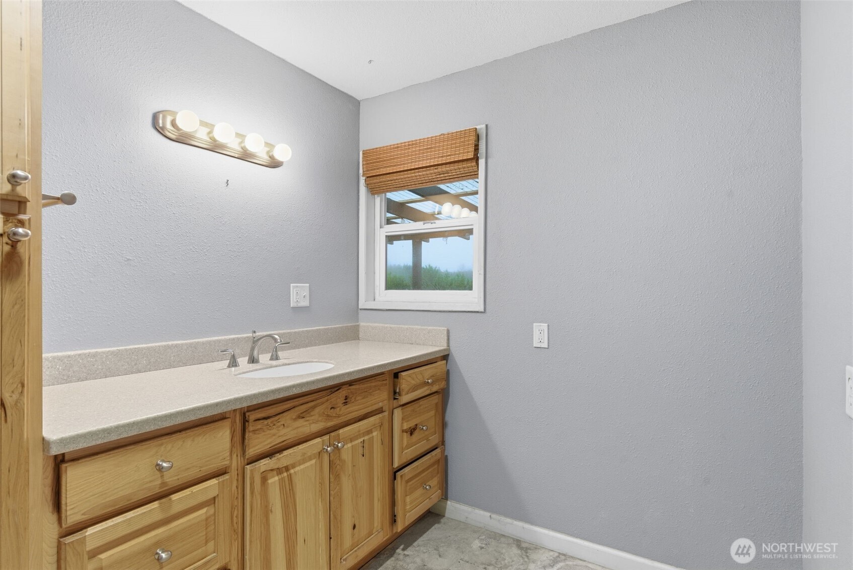 153 Davidson Drive Sequim, WA 98382 - Photo 20 of 36 a bathroom with a sink and a mirror
