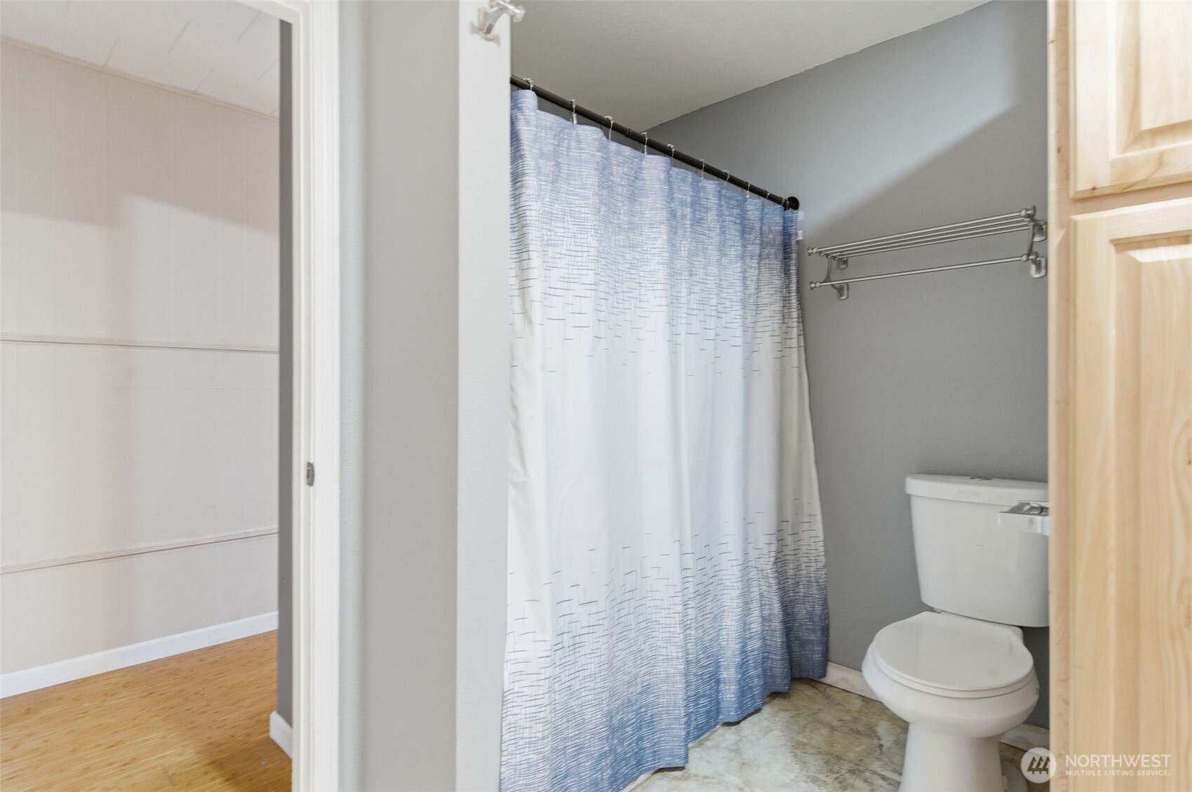 153 Davidson Drive Sequim, WA 98382 - Photo 21 of 36 a white toilet sitting next to a shower