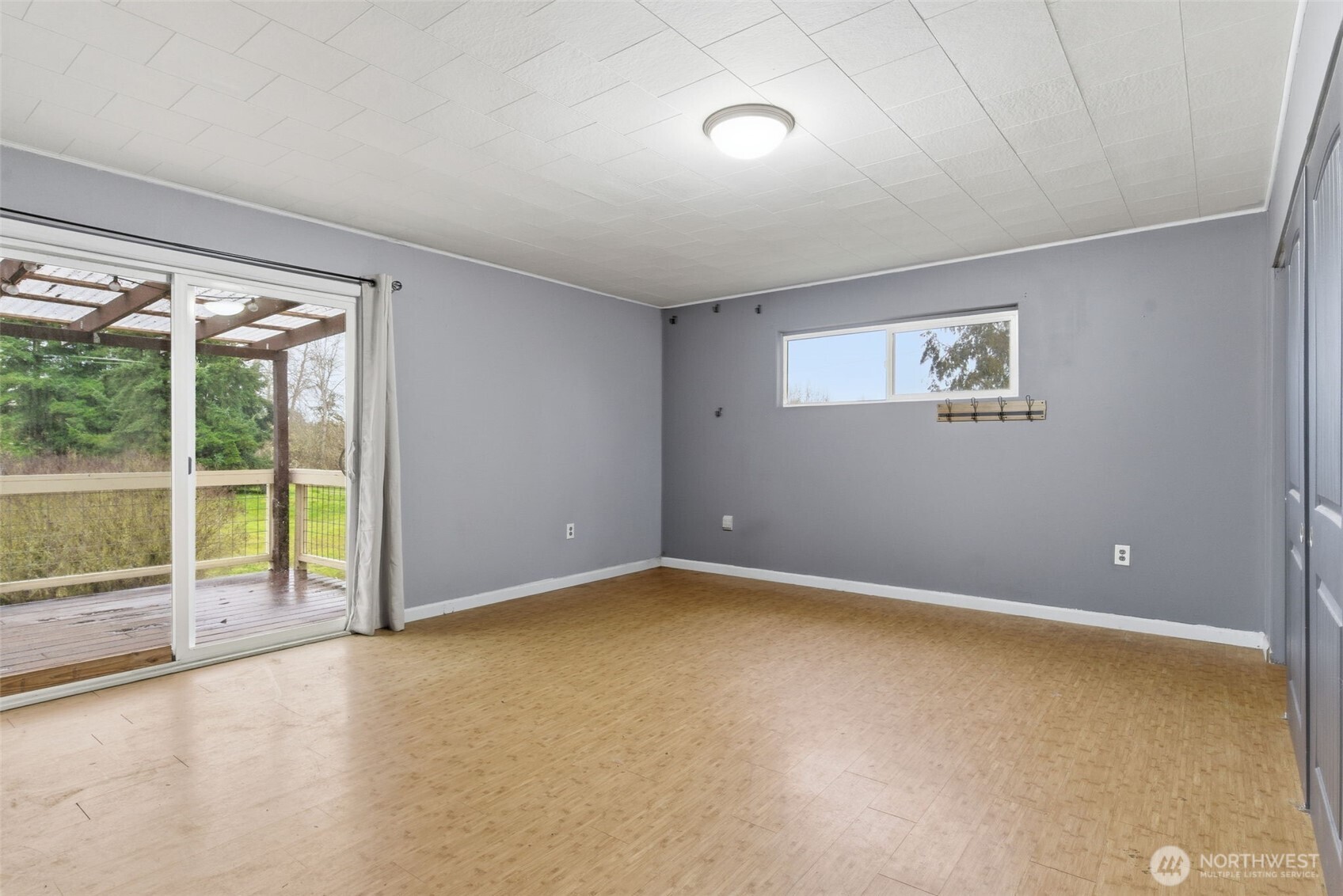 153 Davidson Drive Sequim, WA 98382 - Photo 22 of 36 a view of an empty room with a window