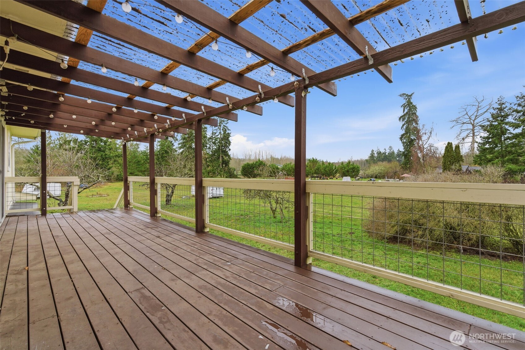 153 Davidson Drive Sequim, WA 98382 - Photo 25 of 36 a view of a house with a yard