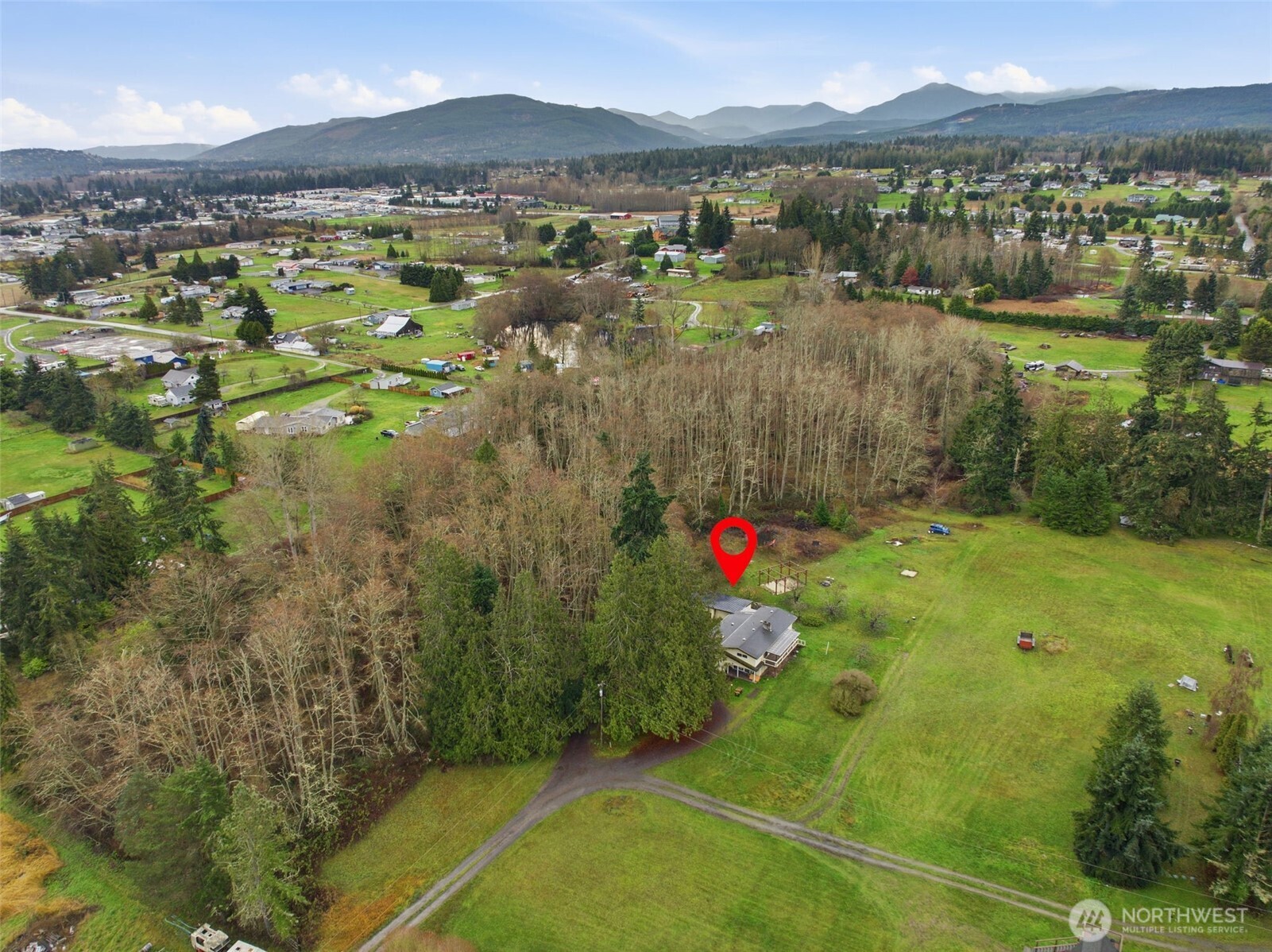 153 Davidson Drive Sequim, WA 98382 - Photo 32 of 36 a view of lake with houses