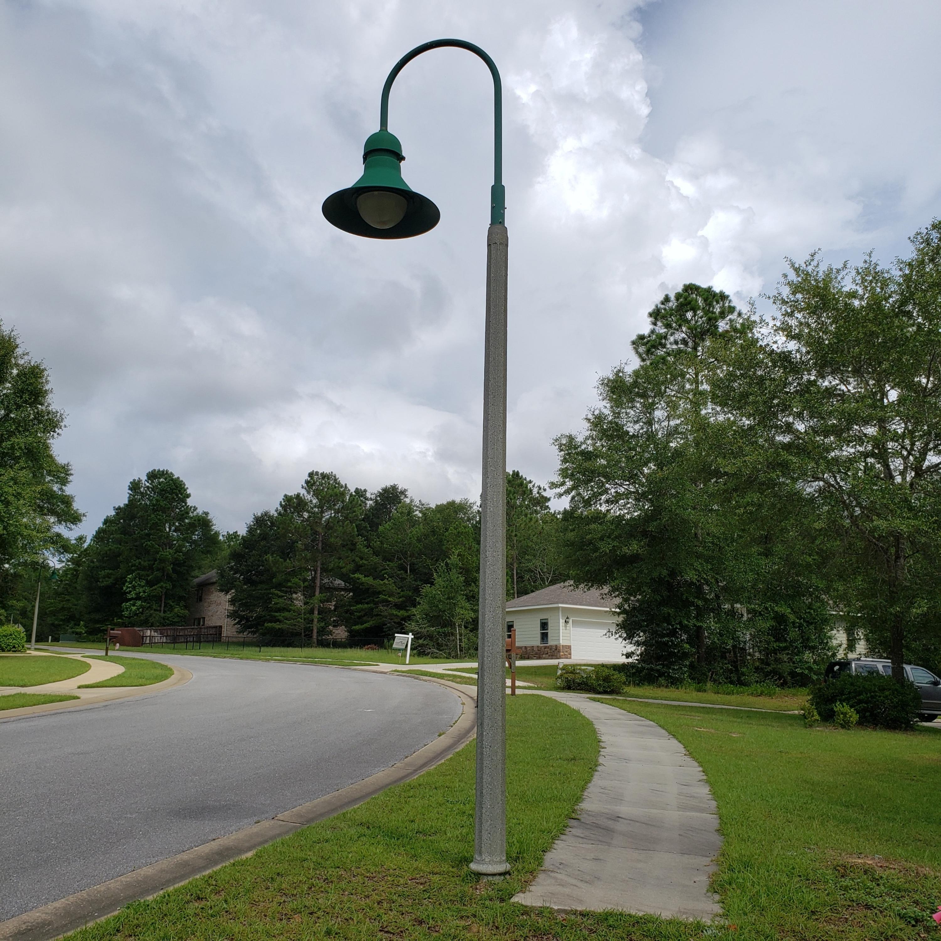 6068 Carina Road Crestview, FL 32539 - Photo 5 of 28 a front view of a house with a yard