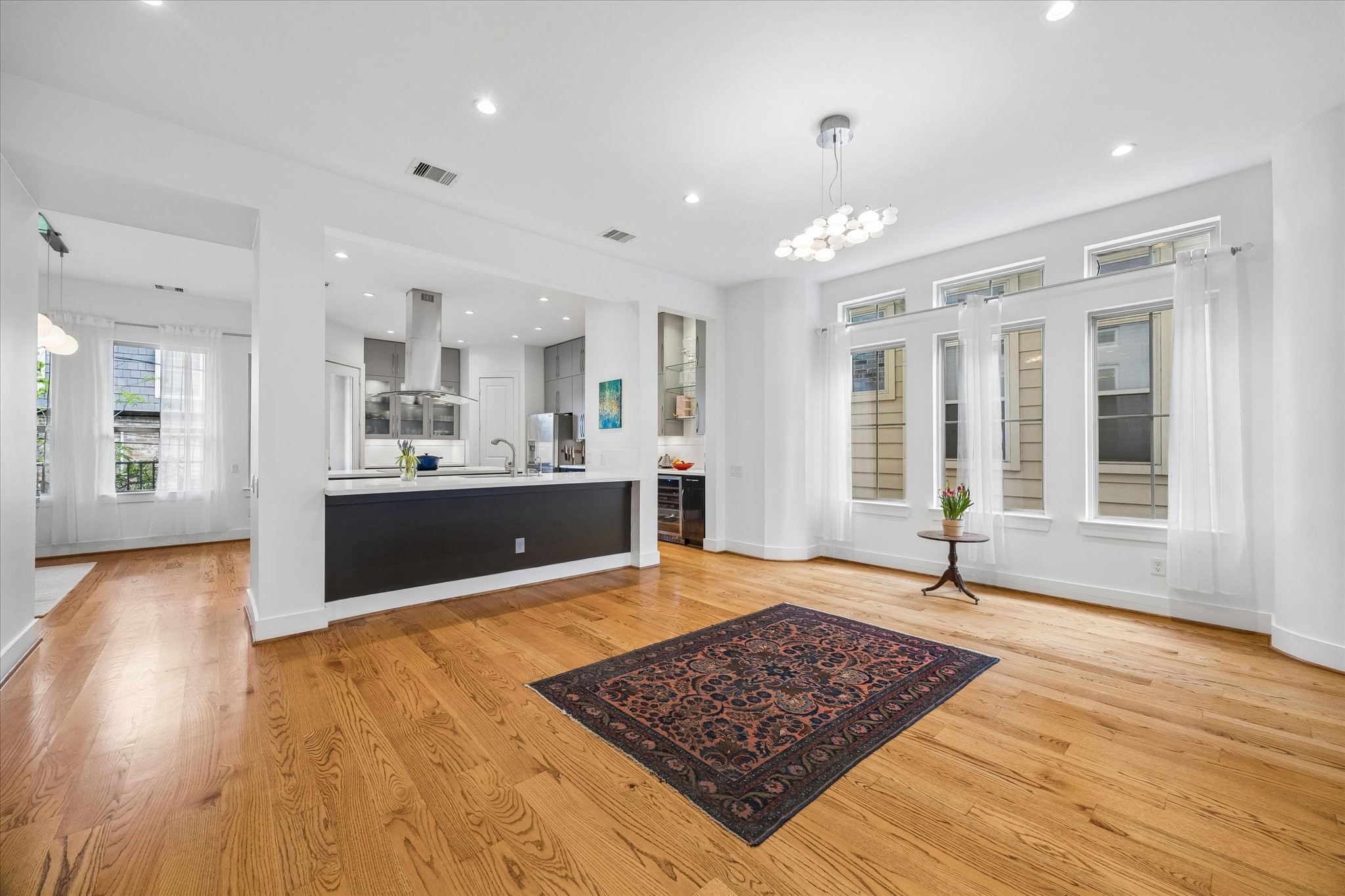 1518 West Clay Street Houston, TX 77019 - Photo 12 of 36 Dining area, currently used as yoga studio, is easily accessed from the kitchen. Note the beautiful oak hardwood floors throughout the 2nd floor.