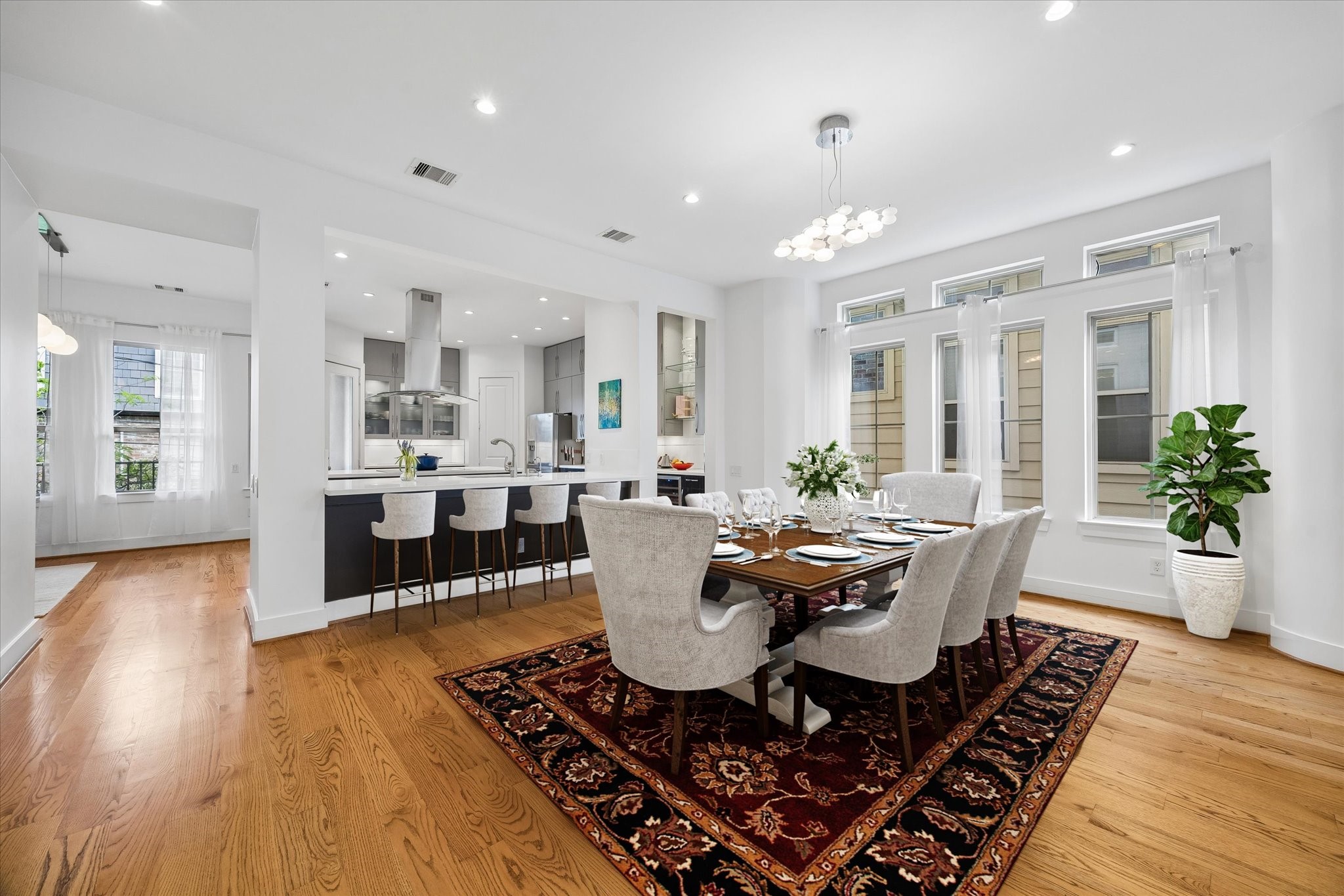 1518 West Clay Street Houston, TX 77019 - Photo 13 of 36 Dining room with virtual table and chairs.