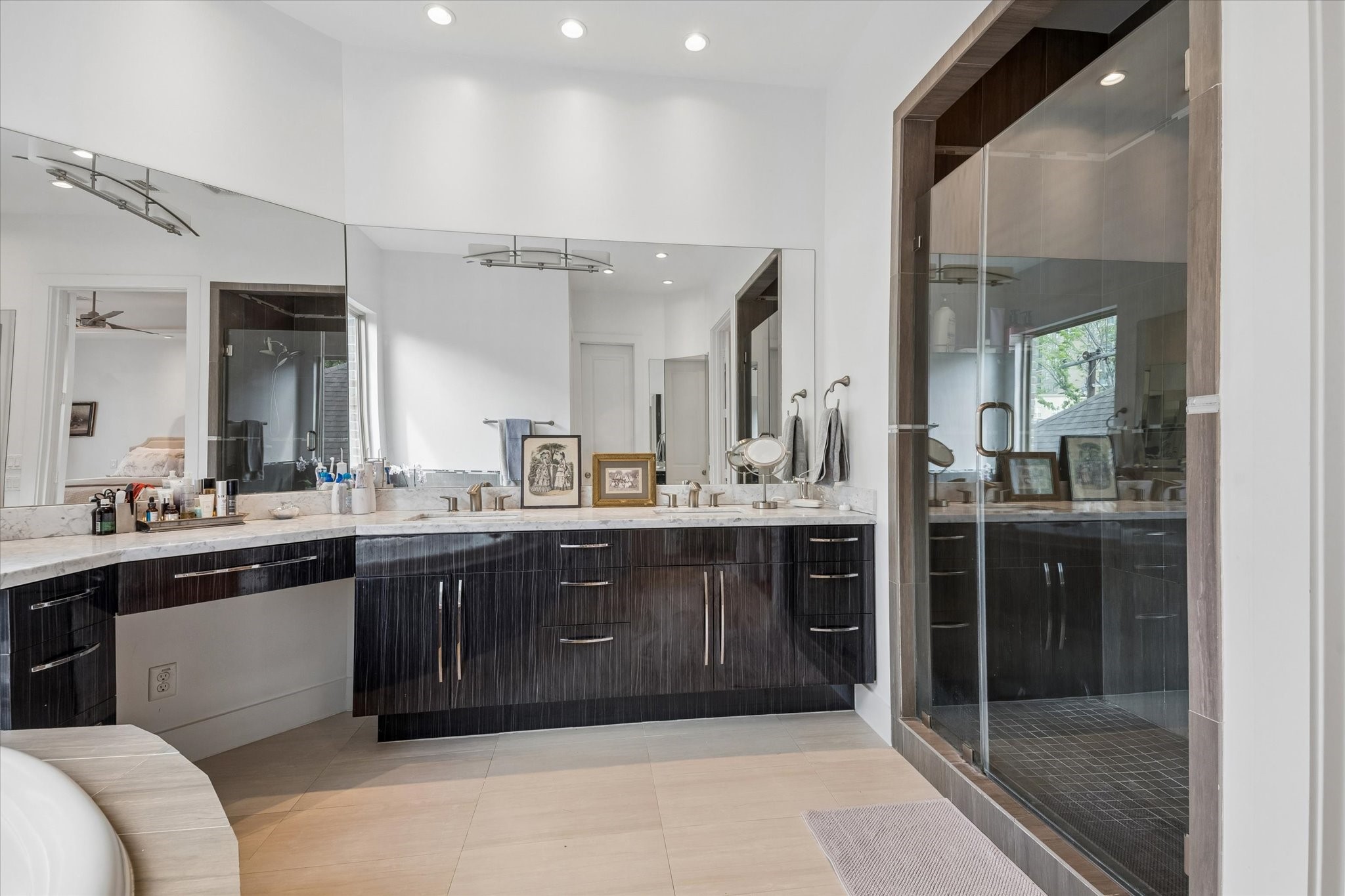 1518 West Clay Street Houston, TX 77019 - Photo 21 of 36 Primary bath also has dual sinks and frameless shower area.