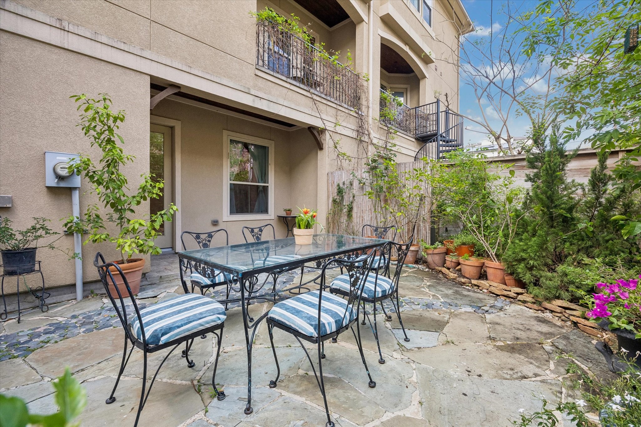 1518 West Clay Street Houston, TX 77019 - Photo 30 of 36 Patio and garden looking to home and back entrance.