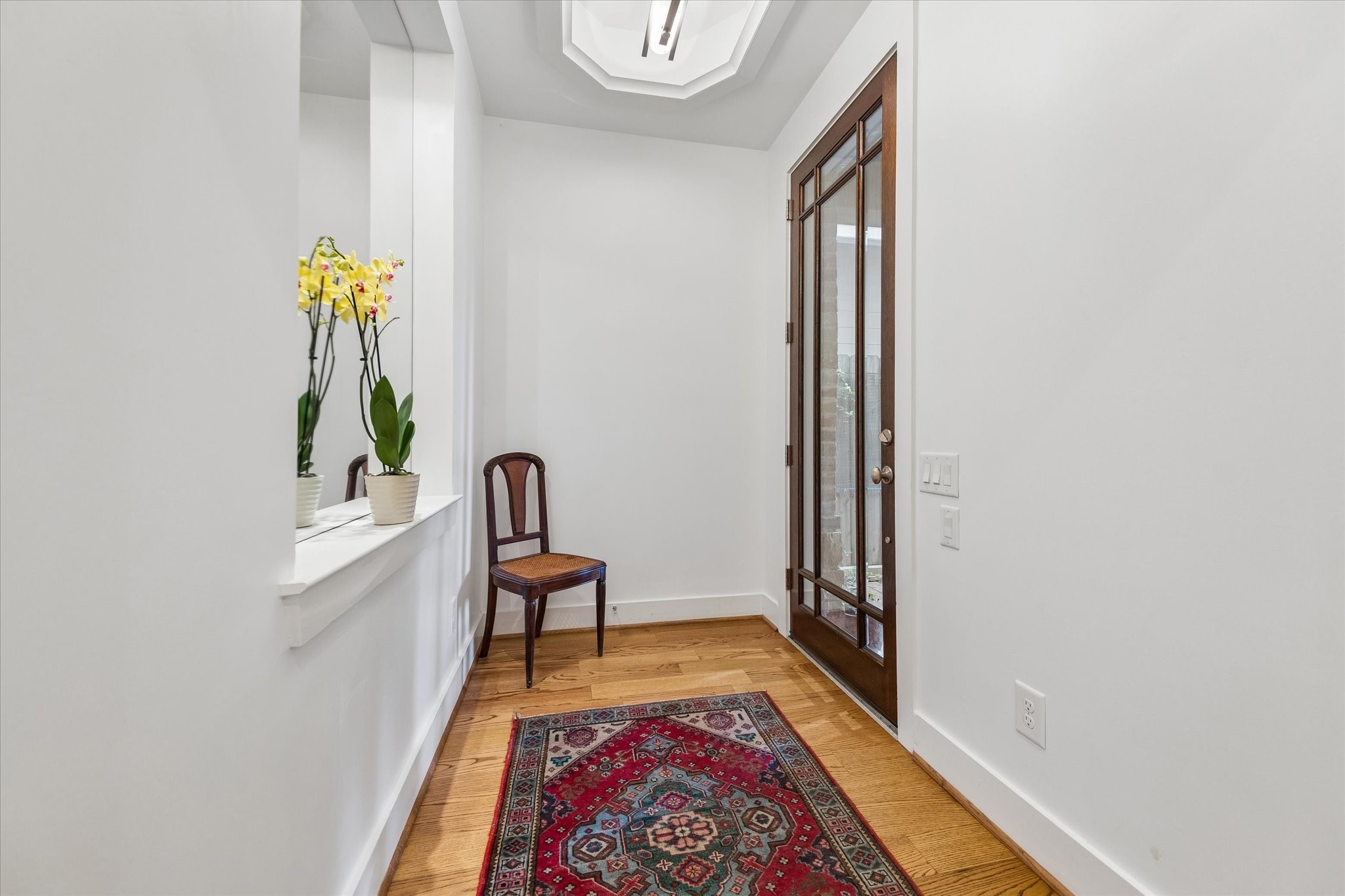 1518 West Clay Street Houston, TX 77019 - Photo 4 of 36 The foyer invites you into the first floor of the home.