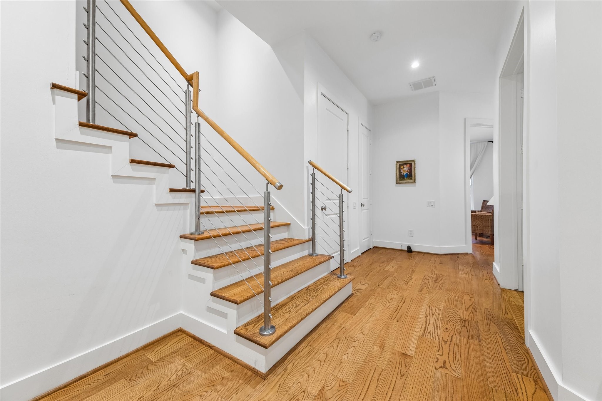 1518 West Clay Street Houston, TX 77019 - Photo 5 of 36 The hallway to the right of the foyer leads to a first floor office/study/gameroom, elevator capable closet and then on to bedroom and full bath.