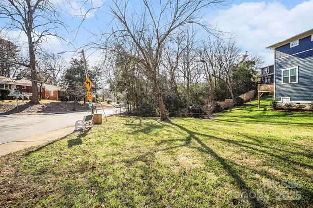 a view of a playground with basketball court