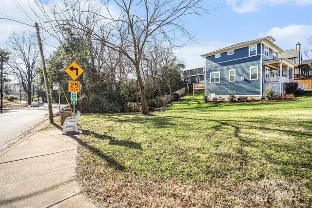 a view of swimming pool with outdoor seating