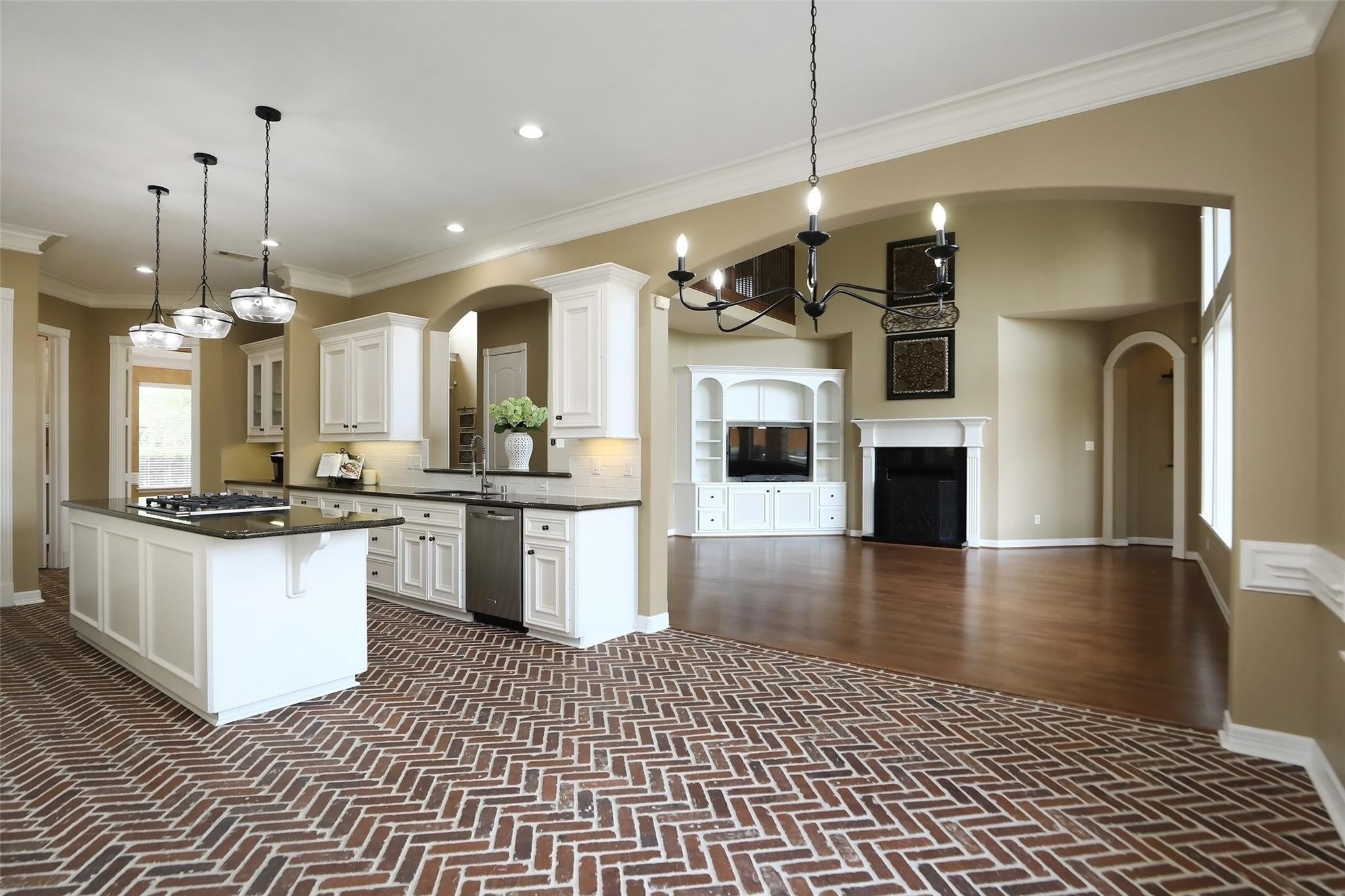 13810 Nathan Ridge Lane Cypress, TX 77429 - Photo 18 of 50 a kitchen with granite countertop a stove a sink and a refrigerator