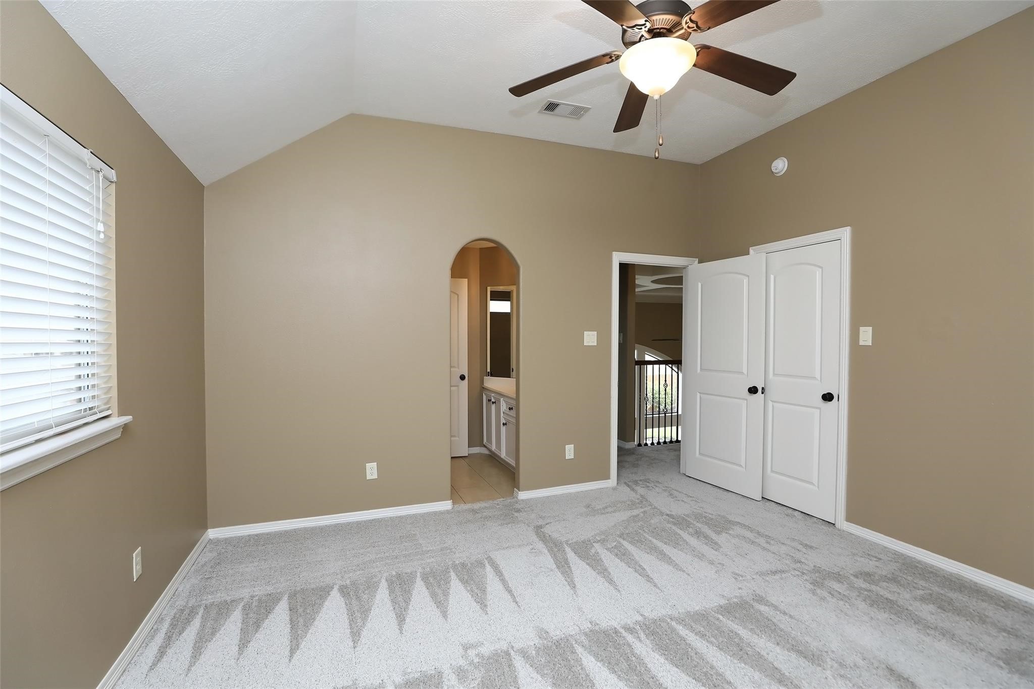 13810 Nathan Ridge Lane Cypress, TX 77429 - Photo 40 of 50 a view of an empty room with window and chandelier fan