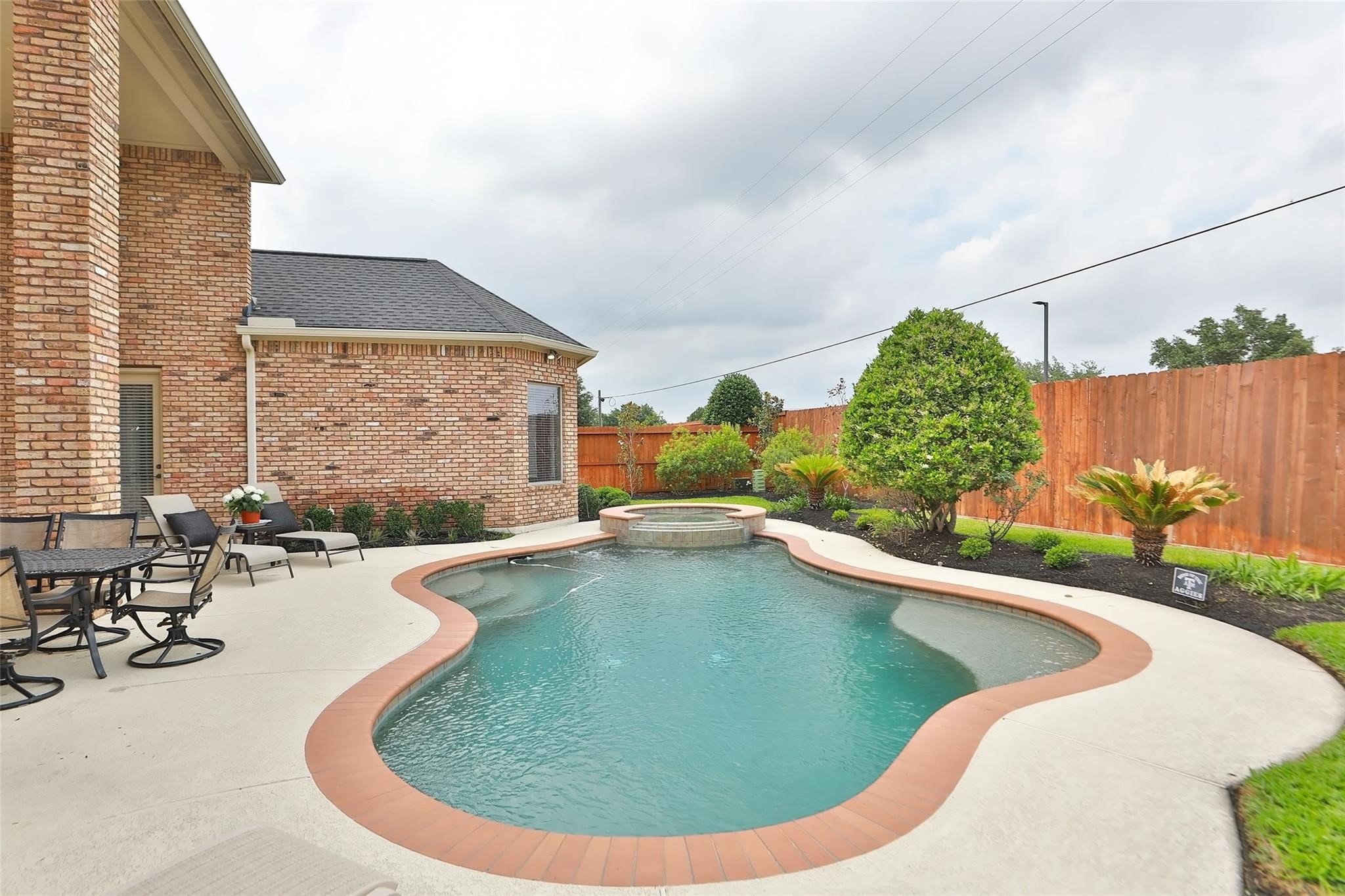 13810 Nathan Ridge Lane Cypress, TX 77429 - Photo 50 of 50 a view of swimming pool from a lounge chair