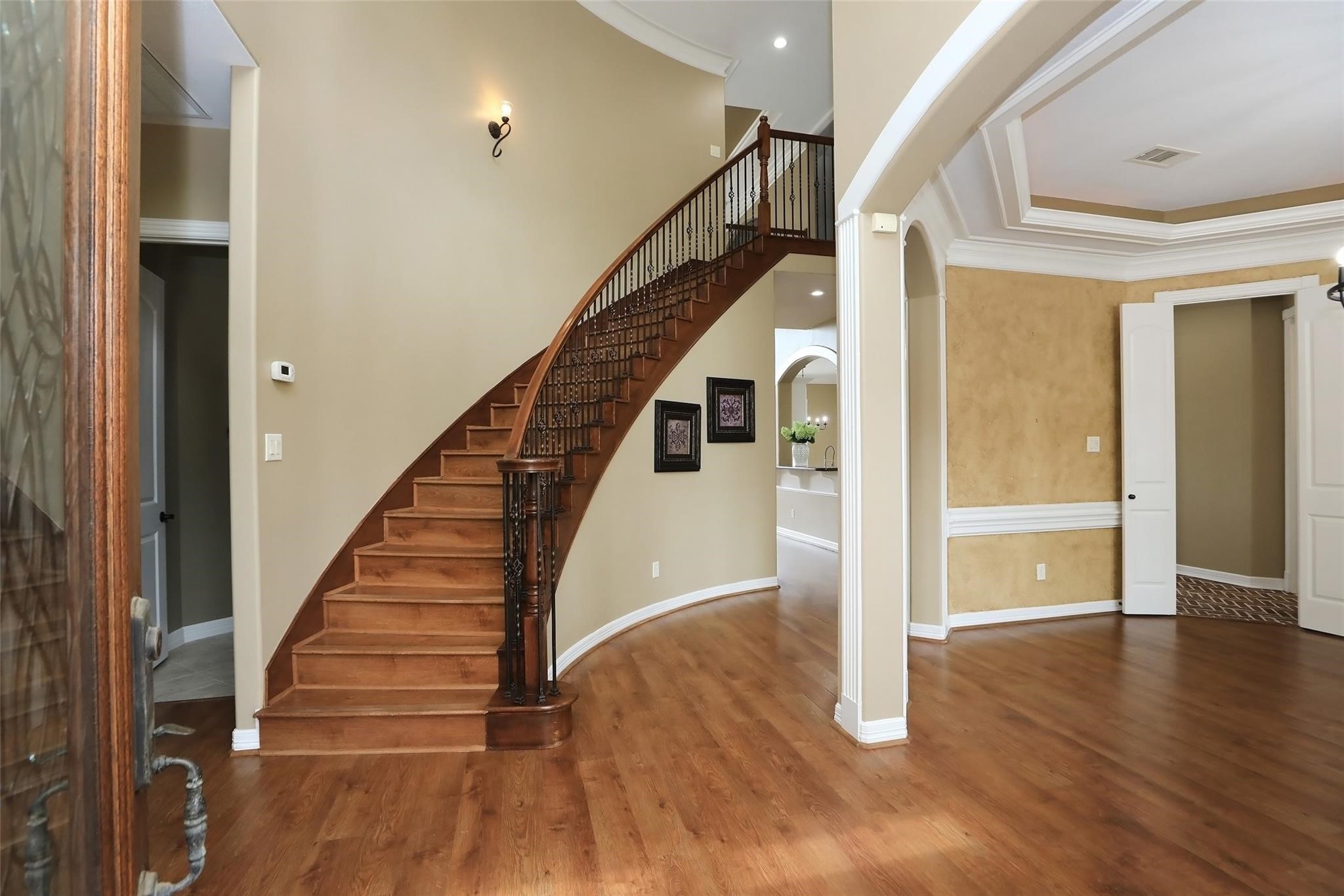 13810 Nathan Ridge Lane Cypress, TX 77429 - Photo 6 of 50 a view of an entryway with wooden floor and door