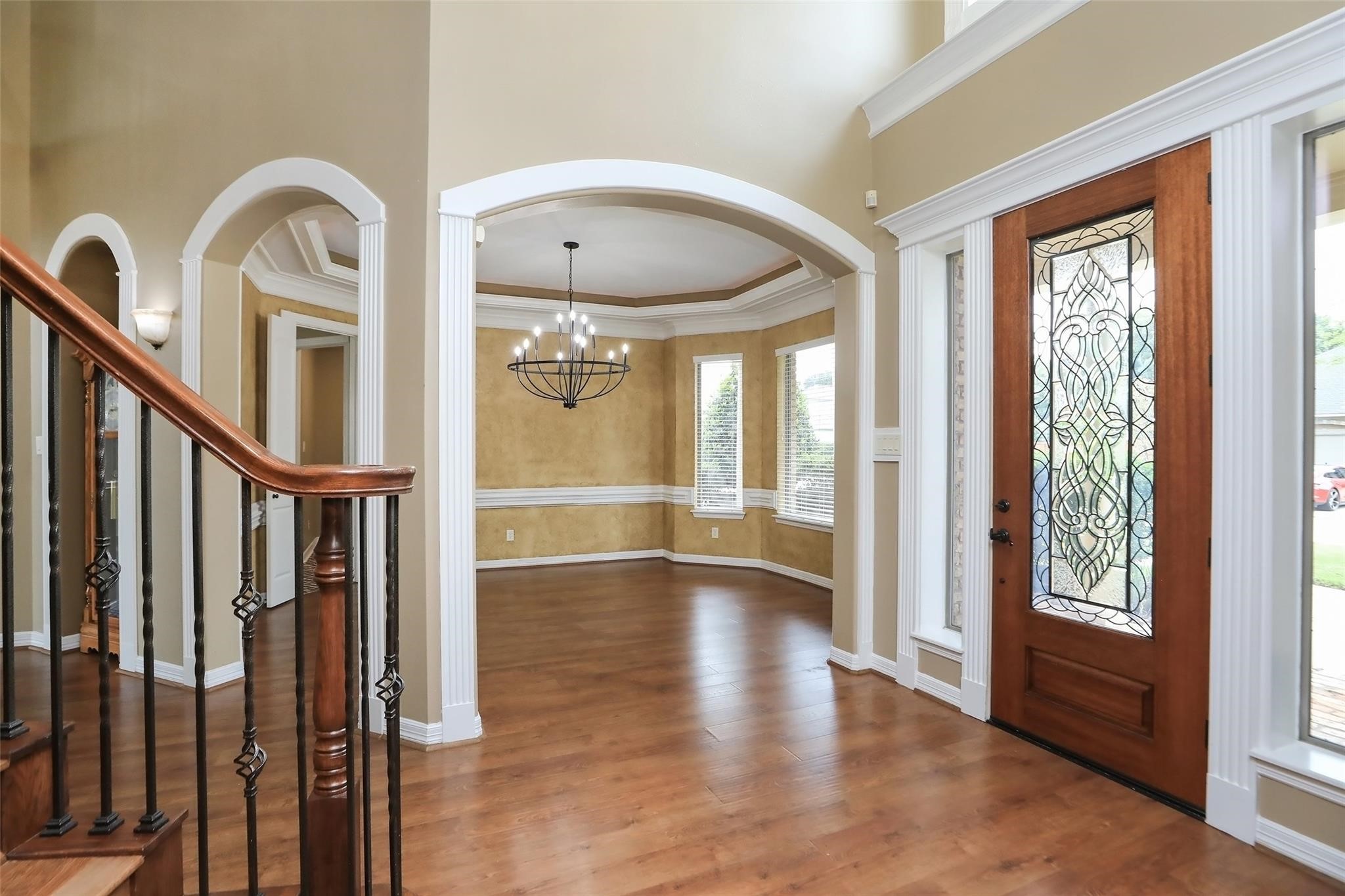 13810 Nathan Ridge Lane Cypress, TX 77429 - Photo 7 of 50 a view of an entryway with wooden floor and door