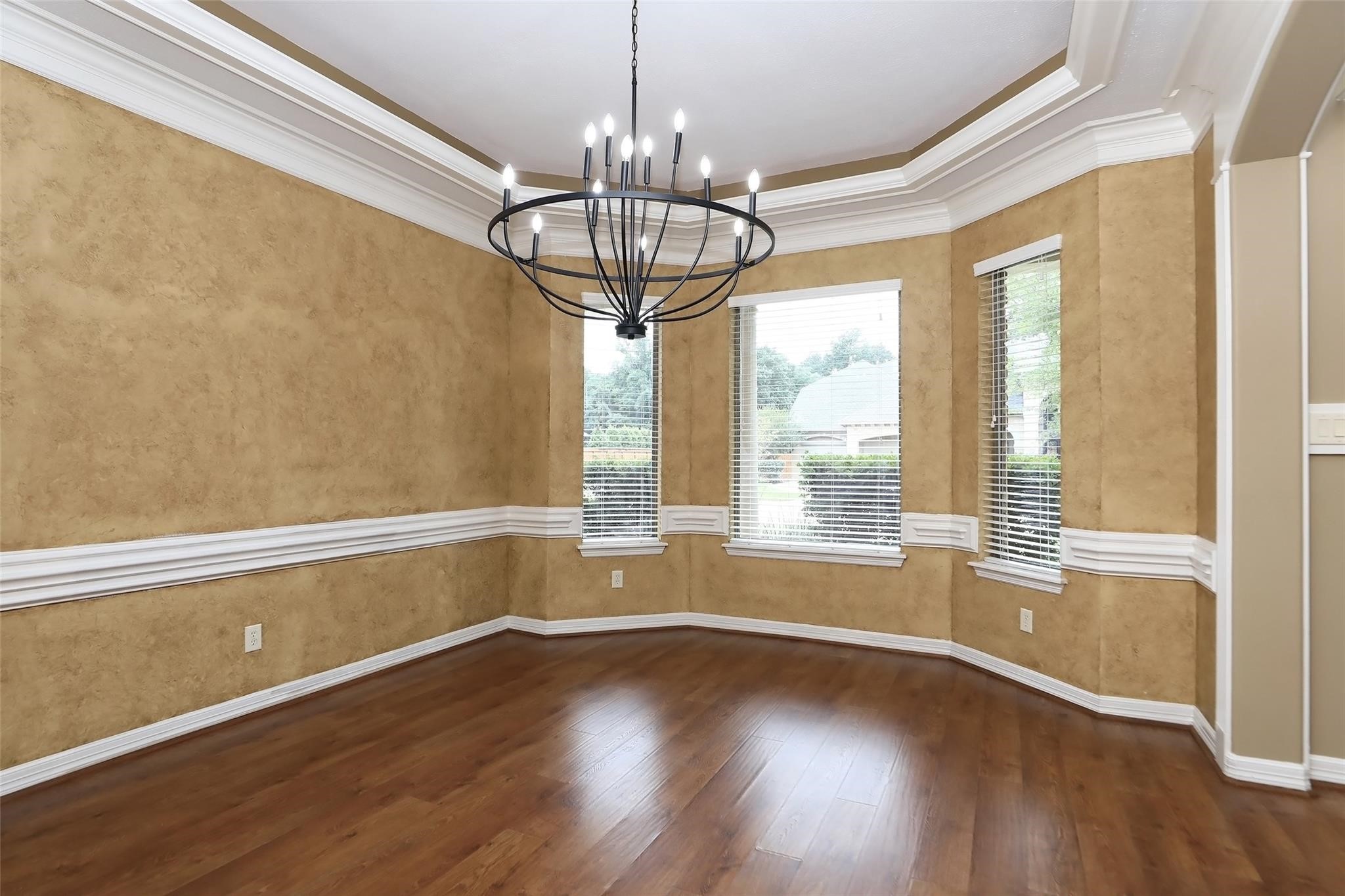 13810 Nathan Ridge Lane Cypress, TX 77429 - Photo 8 of 50 a view of empty room with wooden floor and fan