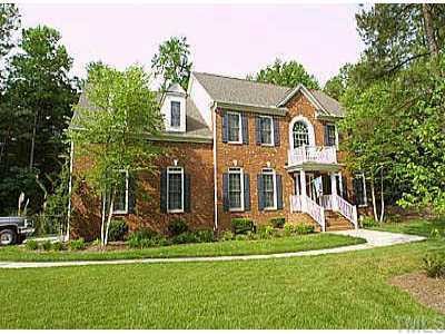 12105 Castle Ridge Road Raleigh, NC 27614 - Photo 1 of 1 a front view of a house with a yard