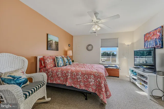 a bedroom with a bed and furniture