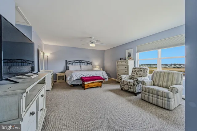 a bedroom with furniture and a couch