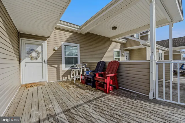 a view of a chairs on the deck