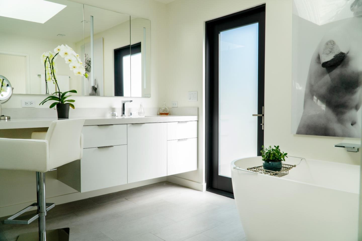 1505 Venadero Road Pebble Beach, CA 93953 - Photo 13 of 36 a bathroom with a sink and a mirror