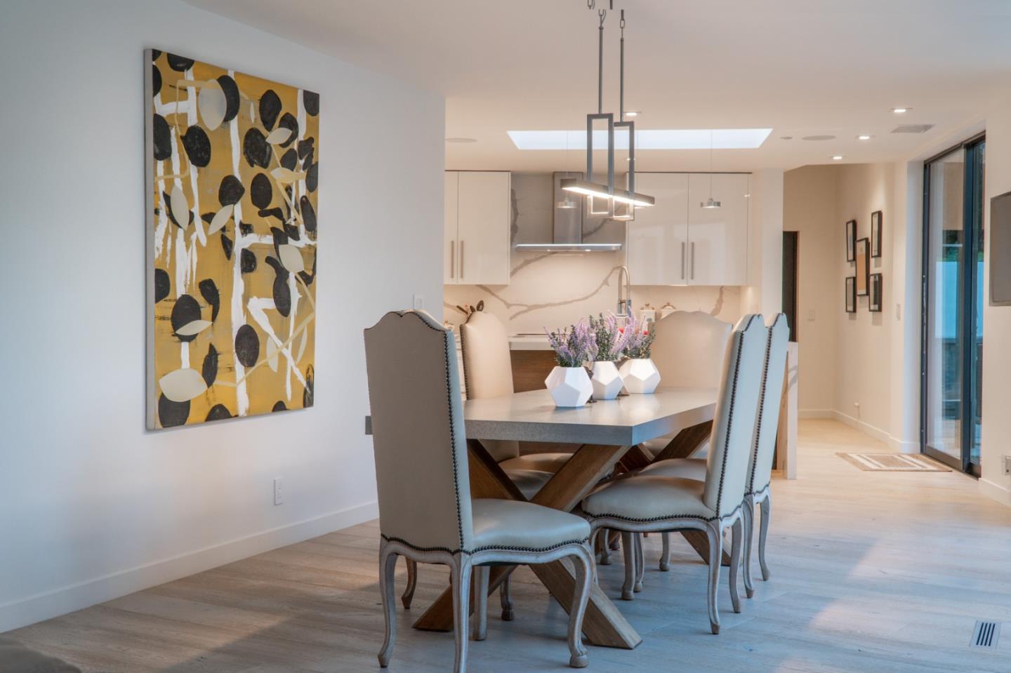1505 Venadero Road Pebble Beach, CA 93953 - Photo 6 of 36 a view of a dining room with furniture and wooden floor