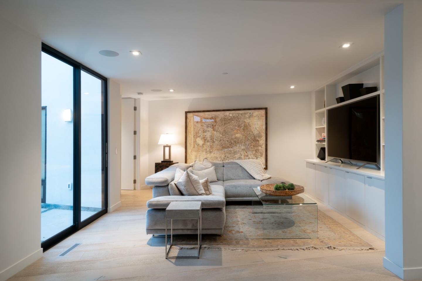 1505 Venadero Road Pebble Beach, CA 93953 - Photo 9 of 36 a living room with furniture and a flat screen tv