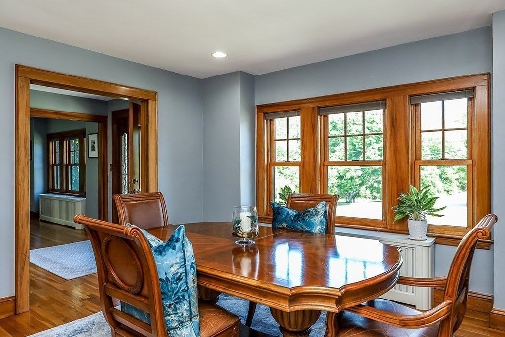 26 Windsor Road Westwood, MA 02090 - Photo 18 of 41 a dining room with furniture and large windows