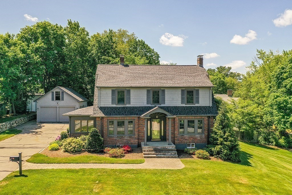 26 Windsor Road Westwood, MA 02090 - Photo 2 of 41 a front view of a house with yard