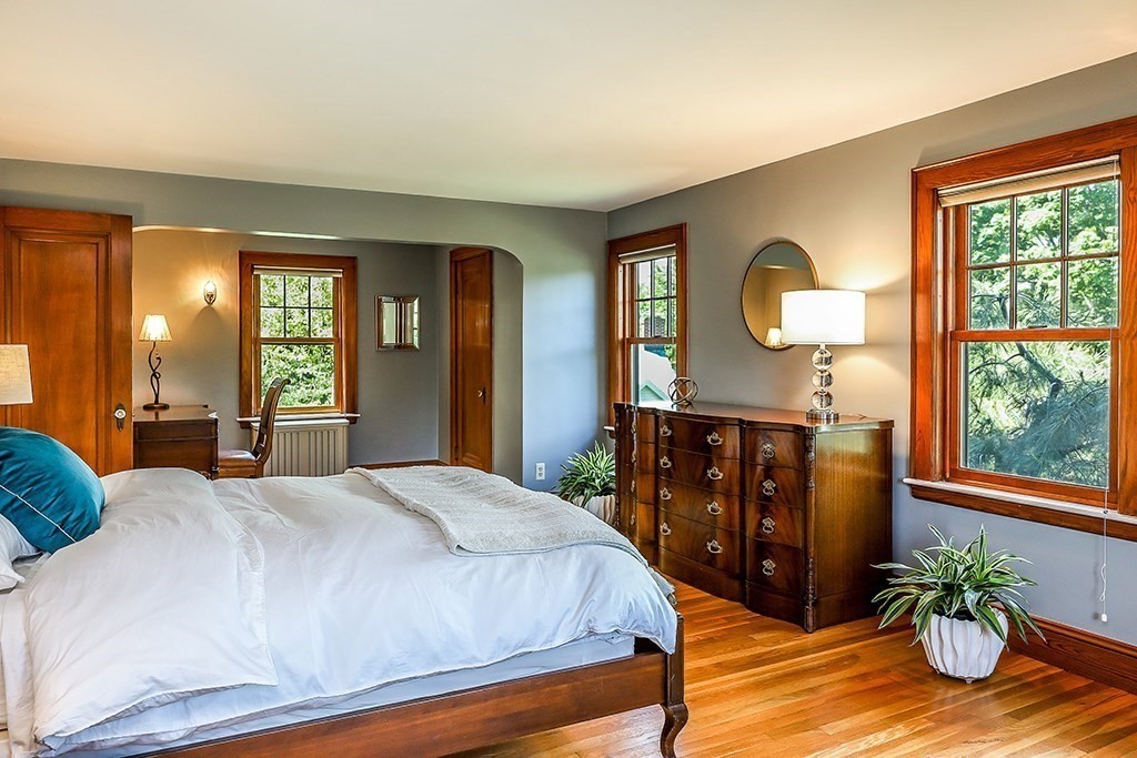 26 Windsor Road Westwood, MA 02090 - Photo 22 of 41 a bedroom with a large bed and large windows
