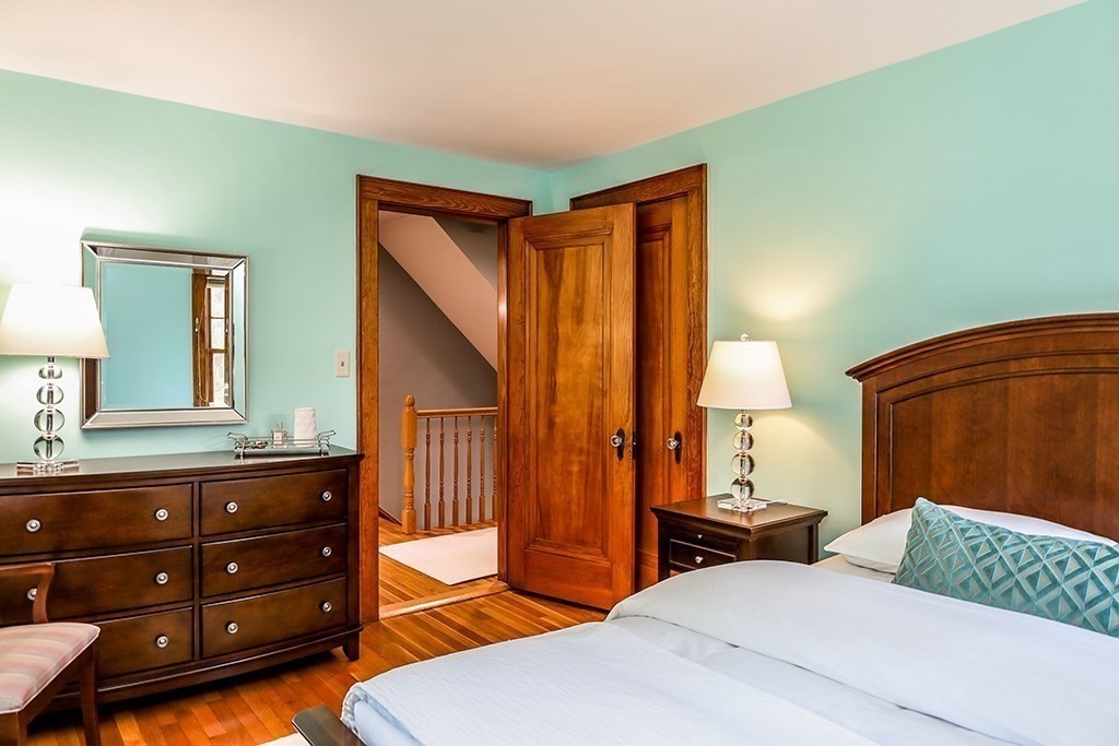 26 Windsor Road Westwood, MA 02090 - Photo 28 of 41 a bedroom with a bed and a dresser