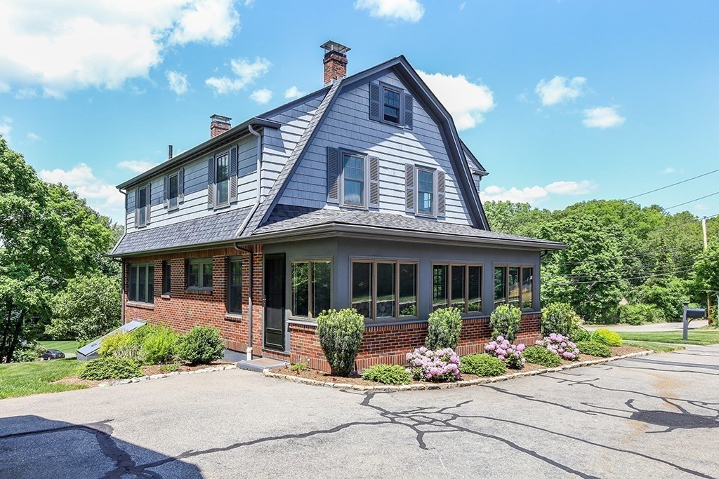 26 Windsor Road Westwood, MA 02090 - Photo 33 of 41 a front view of a house with garden