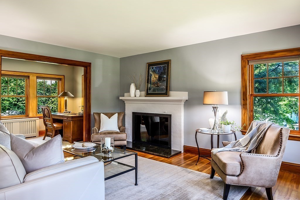 26 Windsor Road Westwood, MA 02090 - Photo 4 of 41 a living room with furniture and a fireplace