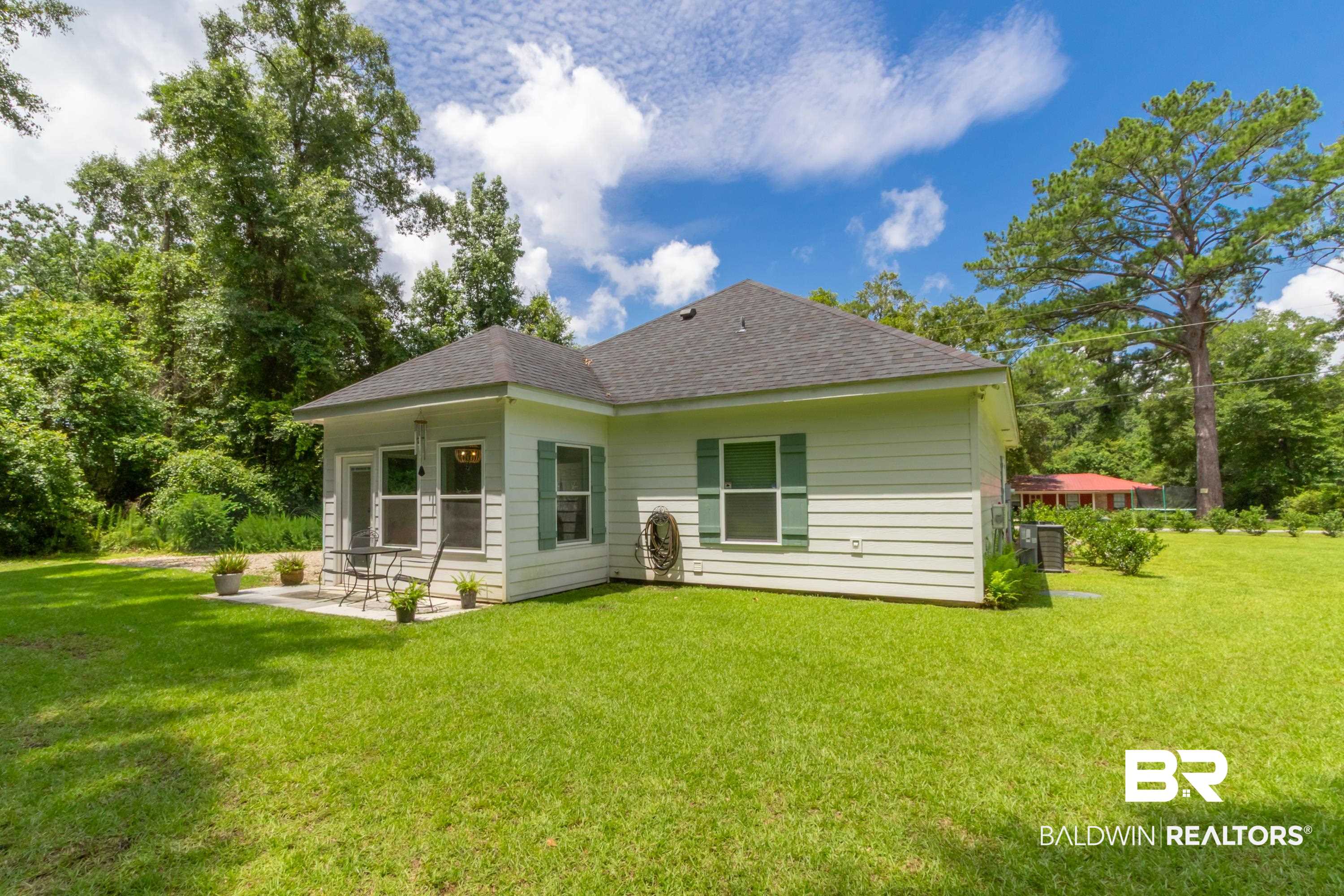 7472 Coopers Landing Road Foley, AL 36535 - Photo 31 of 40 Expansive green lawn surrounds the property