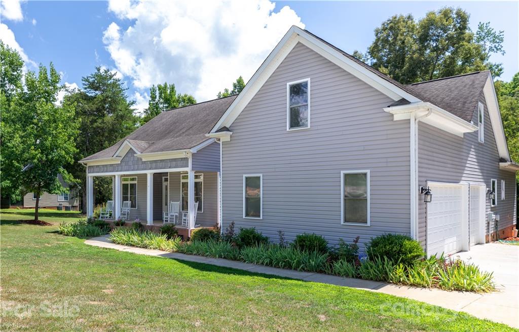 733 Flamingo Road Clover, SC 29710 - Photo 2 of 48 a view of a house with yard and plants