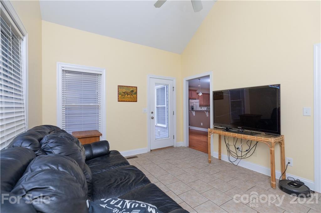 733 Flamingo Road Clover, SC 29710 - Photo 14 of 48 a living room with furniture and a flat screen tv