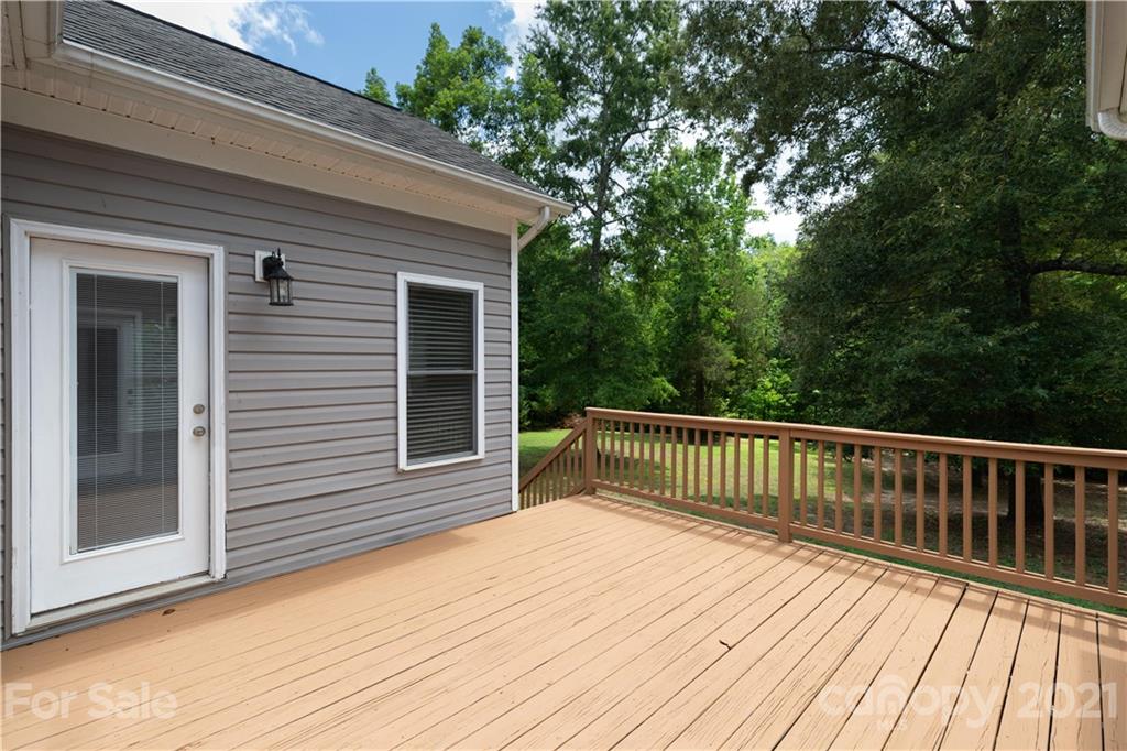 733 Flamingo Road Clover, SC 29710 - Photo 17 of 48 a view of a wooden deck