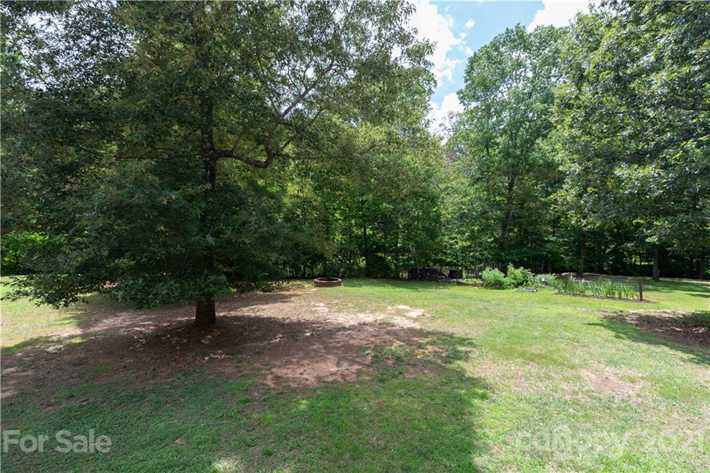 733 Flamingo Road Clover, SC 29710 - Photo 20 of 48 a view of outdoor space with trees all around
