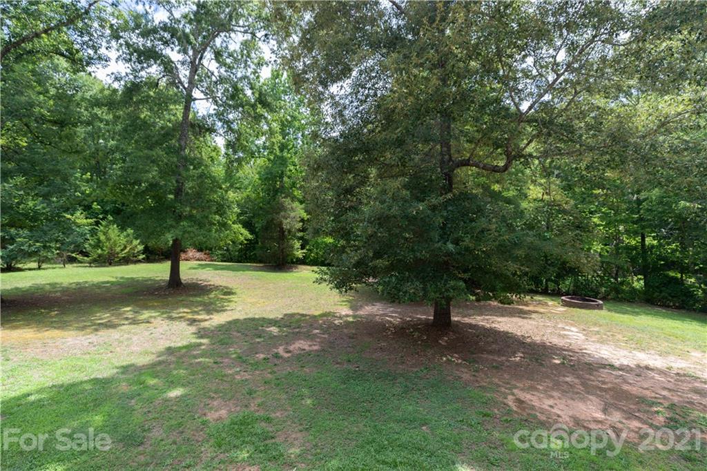 733 Flamingo Road Clover, SC 29710 - Photo 21 of 48 a view of a trees with a yard