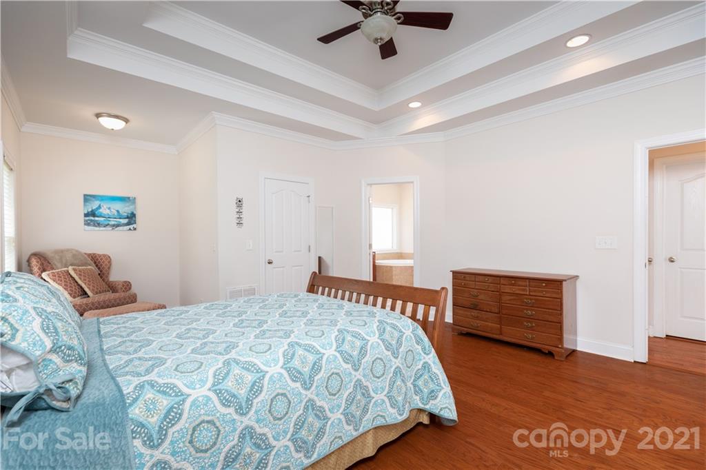 733 Flamingo Road Clover, SC 29710 - Photo 23 of 48 a bedroom with a bed and dresser