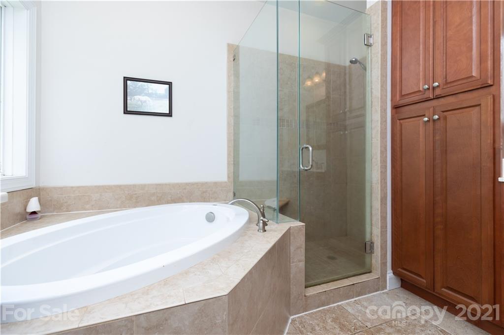 733 Flamingo Road Clover, SC 29710 - Photo 26 of 48 a bathroom with a bathtub and a shower